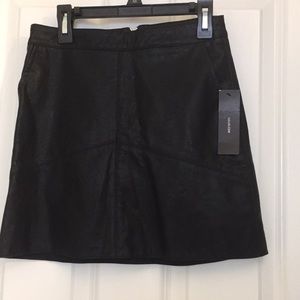 Black leather mini skirt